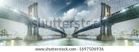 Futuristic sci-fi city and commercial office buildings with bridges and clouds at sunset.