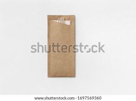 Eco take away paper cutlery set Royalty-Free Stock Photo #1697569360