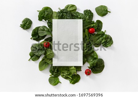 long white paper pouch with greens