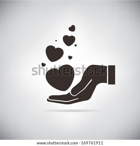 love symbol, hand holding heart