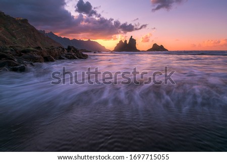 Rocks in the sunset with smoke on the Water