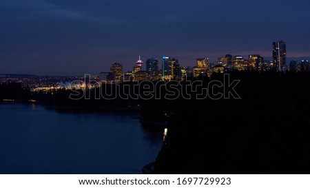          Vancouver skyline at dusk taken atop Lion's Gate Bridge                      