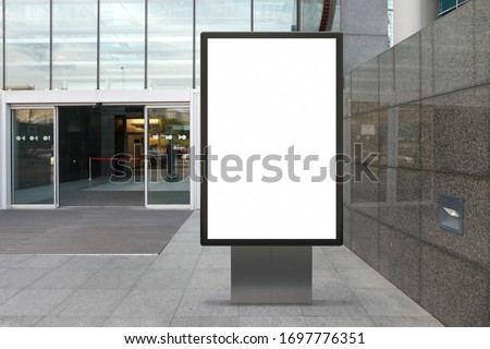 Blank street billboard poster stand mock upnear entace of shopping center in  downtown. 3d illustration. Royalty-Free Stock Photo #1697776351