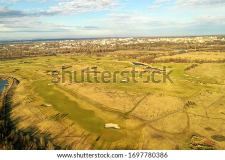 Aerial shot of golf course at the end of winter, Czech Karvina