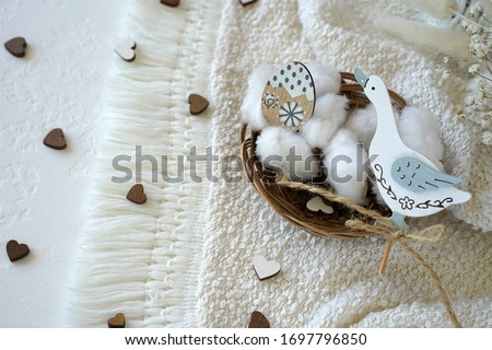    easter decoration with easter  egg and white duck                             