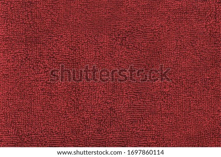 Red terry cloth with curls. Soft canvas texture Royalty-Free Stock Photo #1697860114