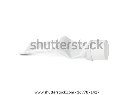 White tube with toothpaste isolated on white background