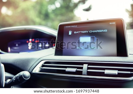 Display informs about battery charge level in the electric car. Interface on the screen was  made in graphic program.