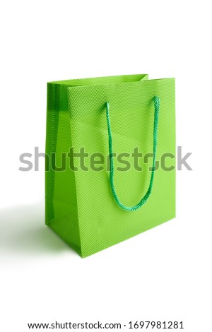 light green bag mockup for design isolated on a white background. space for text. sale concept.