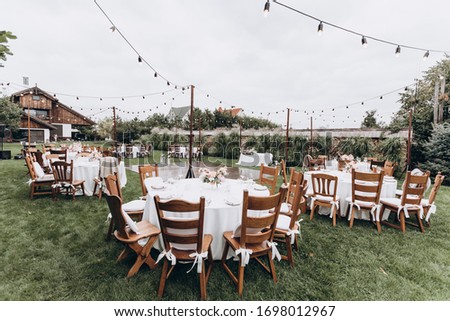 outdoor wedding venue banquet decor Royalty-Free Stock Photo #1698012967