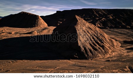 Red desert similar to mars, aerial image of clay and desert land