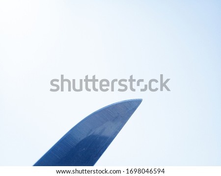 clear closeup of knife edge with light background wallpaper