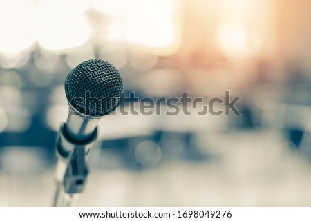 Microphone voice speaker in business seminar, speech presentation, town hall meeting, lecture hall or conference room in corporate or community event for host or townhall public hearing