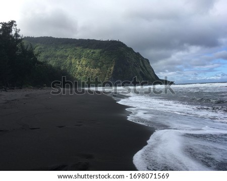 Beautiful black sand beach in Hawaii