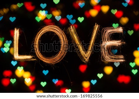 Valentines Day -  Love sparkler firework light alphabet with bokeh light