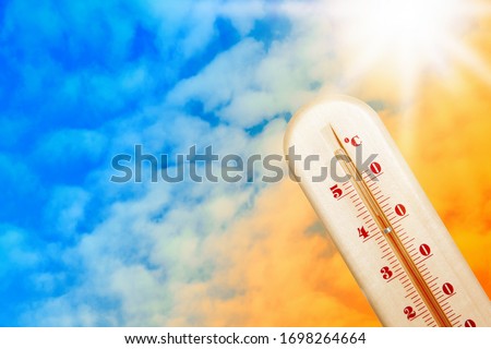 Weather thermometer with high temperature and color sky on background, space for text 