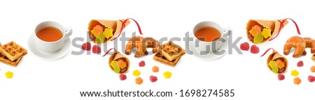 Seamless pattern. Teapot, cup with tea and pastries isolated on a white background.