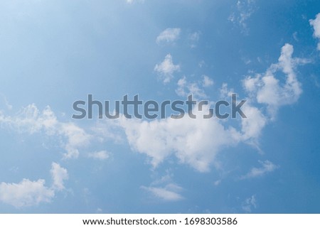 blue sky with natural white clouds. background summer sky.
