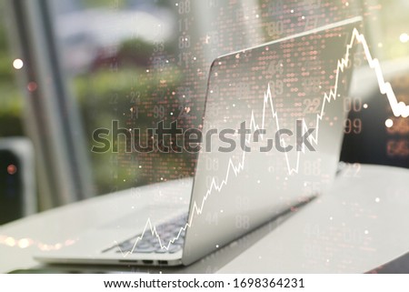 Multi exposure of abstract financial diagram with world map on computer background, banking and accounting concept