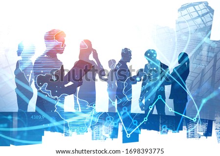 Silhouettes of diverse business people working together in abstract city with double exposure of blurry network interface. Concept of internet and communication. Toned image