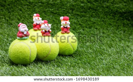 Tennis ball with Santa Claus for Christmas Holiday 