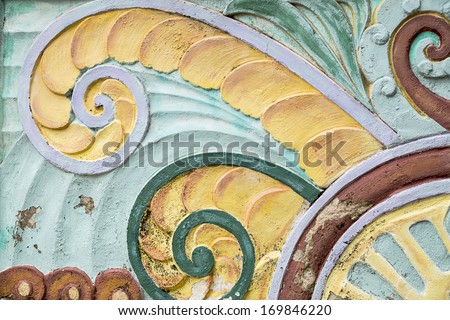 A colorful art deco design on a building in the South Beach area of Miami Beach showcases bold, bright colors. Royalty-Free Stock Photo #169846220