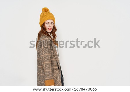 young woman in warm clothes stylish isolated background