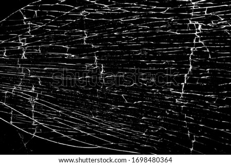 broken glass. cracks isolated on black background