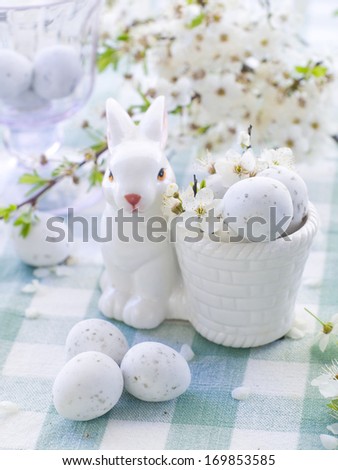 Chocolate easter egg with cherry blossom, selective focus