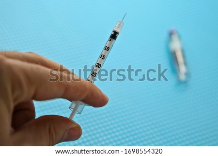 
A cure for the Coronavirus (covid-19) concept image. Dexamethasone steroid medication in a syringe. 