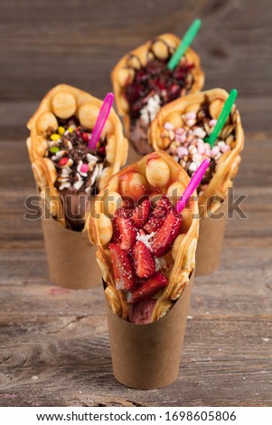 four different types of bubble waffle ice cream to go Royalty-Free Stock Photo #1698605806
