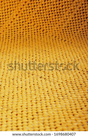 Seamless yellow carpet rug texture background from above, carpet material pattern texture flooring