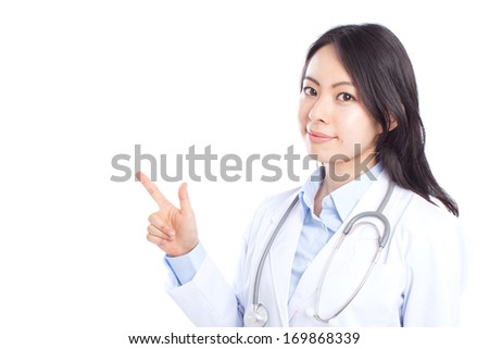 young doctor woman pointing copy space isolated on white background