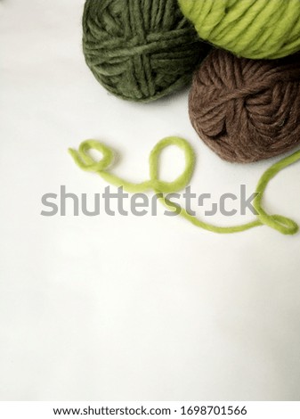 balls of yarn in the corner photo