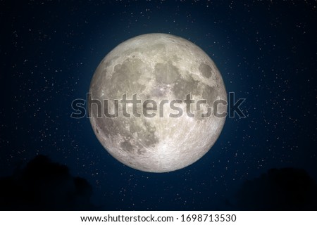 Full Moon in space with dark cloud in night sky. (Elements of this image furnished by NASA.) Royalty-Free Stock Photo #1698713530