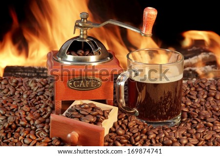 Coffee Mug and Old Coffee Grinder at the fireplace