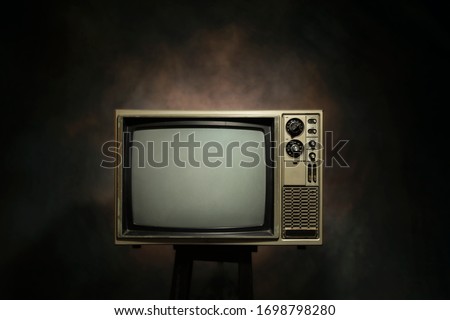 Retro old television on the black background, clipping path Royalty-Free Stock Photo #1698798280