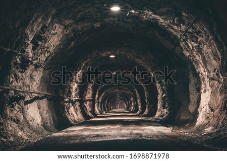 
Rock Tunnel Mountain Lights Road Royalty-Free Stock Photo #1698871978