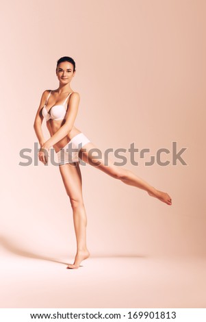 dancing sepia ballerina in white underwear