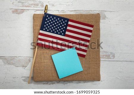 Blue square blank empty posted note and one American flag add text 