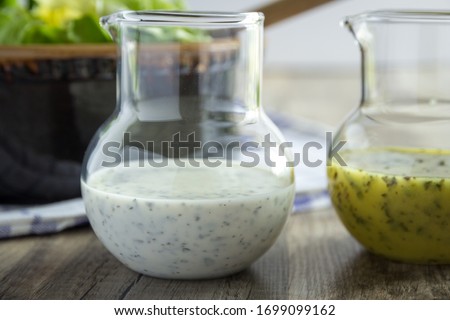 Salad dressings herb yogurt vinegar food Royalty-Free Stock Photo #1699099162