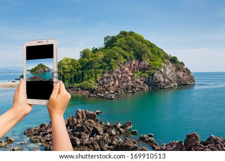 Take photo beauty island by tablet