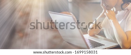 Asian woman use laptop for church online concept. The reasons for closing church due to epidemics Epidemics, CoronaVirus, Covid-19. worship online. Royalty-Free Stock Photo #1699158031