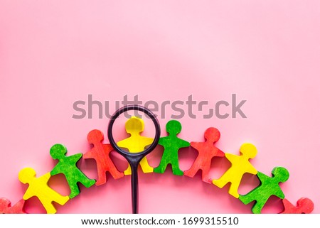 Figures of people on pink desk top view. Human resources, hiring and recruitment concept copy space