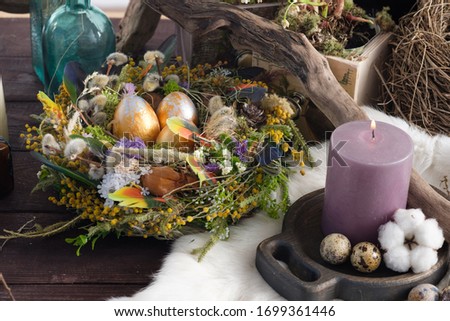 Easter still life with candles and easter decoration. Easter holiday concept.