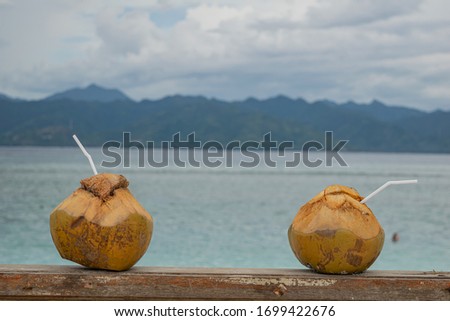 coconut served on beach around Bali
