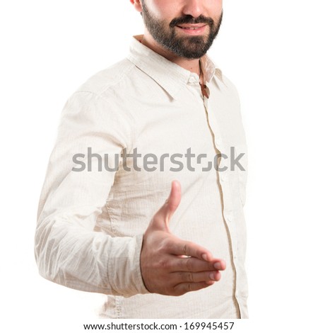 businessman making a deal over isolated white background 