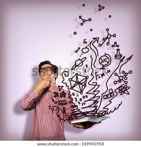 young scientist holding a book, fly out different ideas. concept of creativity