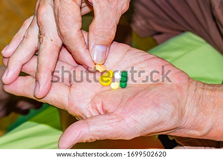 Old age and illnesses of pharmaceutical medicament severe gout in men suffering from joint pain, bone pain, gout ,arthritis ,arm, foot, knee, rheumatoid symptoms, Concept of abstract pain and despair.