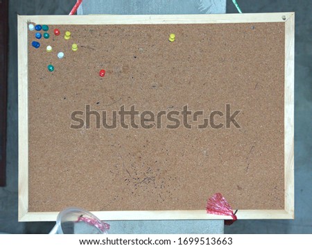 Empty cork board That has been used.